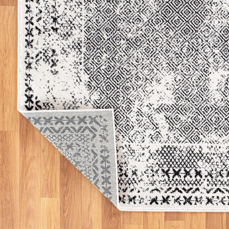 Black Geometric 5' x 7' Synthetic Easy Care Area Rug