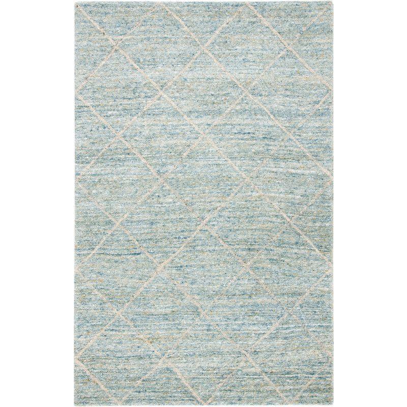 Hand-loomed Tranquility Blue Round Wool Area Rug - 59"