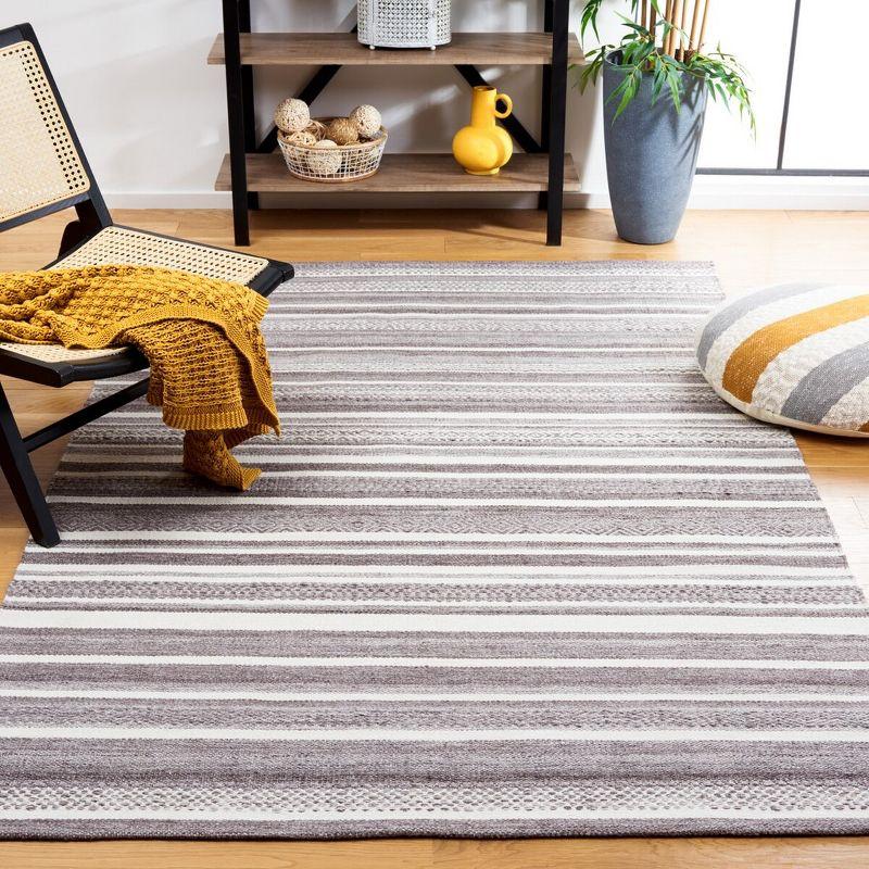 Gray and Ivory 4' x 6' Striped Wool and Synthetic Flat Woven Rug