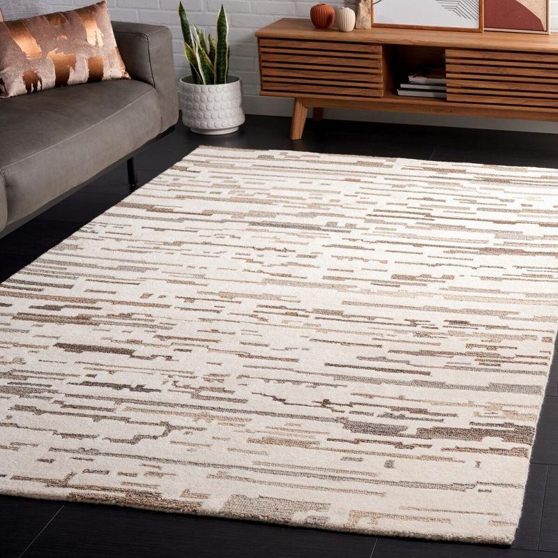 Ivory and Gray Hand Tufted Wool 4' x 6' Area Rug