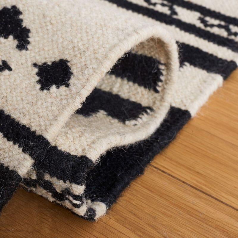 Aderinsola Flatweave Wool Southwestern Rug