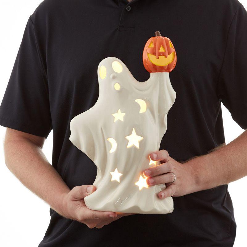 Pre-Lit Ceramic Halloween Ghost Holding Pumpkin Hand-Painted Decor