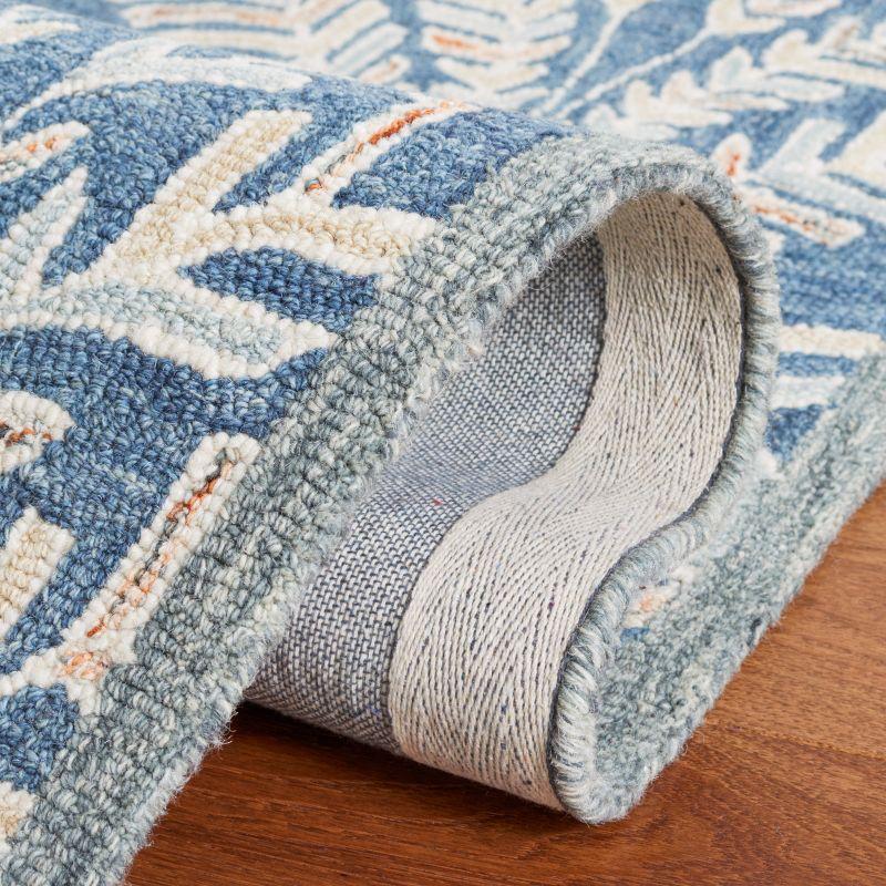 Chaithra Hand Tufted Wool Floral Rug