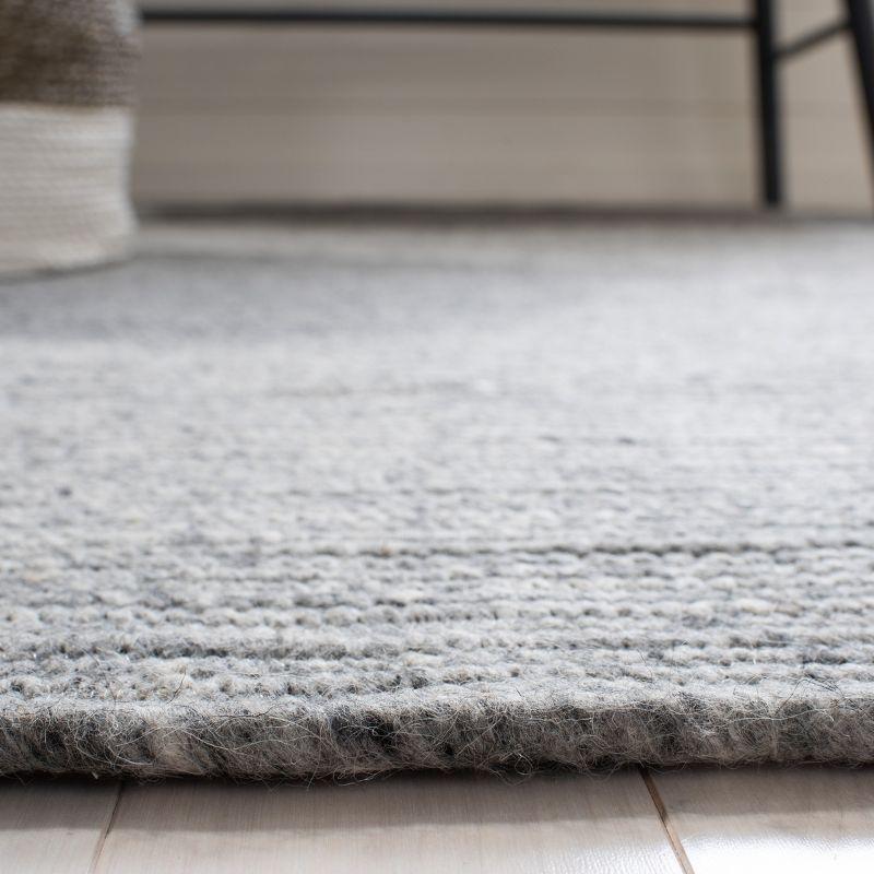 Gray 5' x 7' Oval Handmade Braided Wool Rug