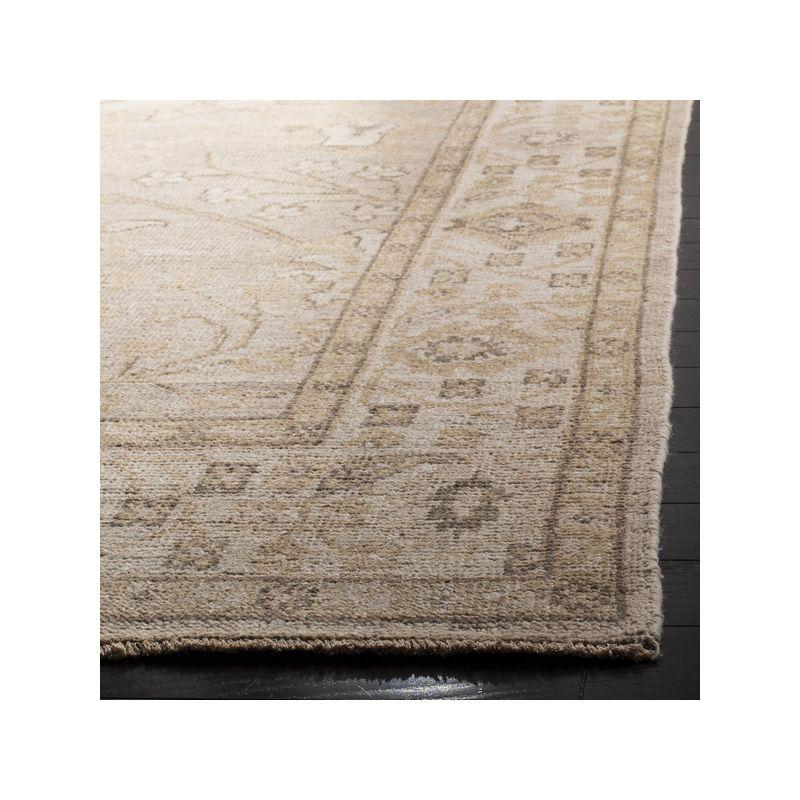 Izmir IZM134 Hand Knotted Area Rug - Gold/Ivory - 9'x12' - Safavieh