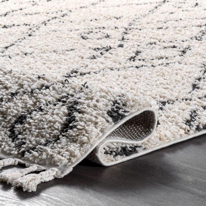 Ivory Oval Shag Reversible Synthetic Area Rug, 5' x 8'