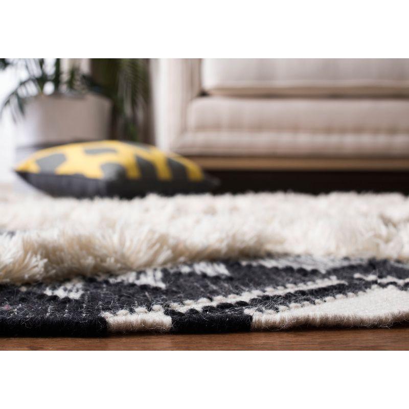 Handwoven Black and Ivory Wool Tribal Area Rug 6' x 9'