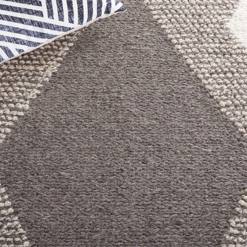 Ivory and Beige Hand-Woven Wool Area Rug - 3' x 5'