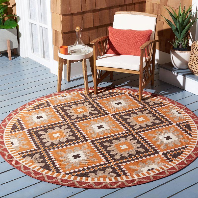 Rust/Red 6'7" Round Reversible Stain-Resistant Synthetic Rug