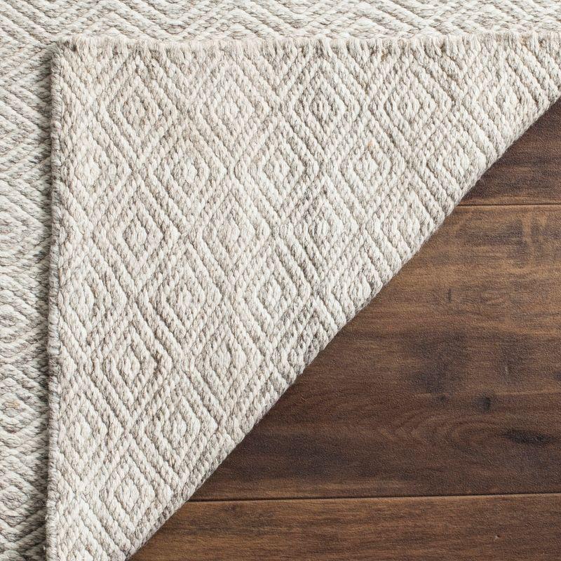 Bohemian Ivory & Silver Geometric Wool Area Rug - 4' x 6'