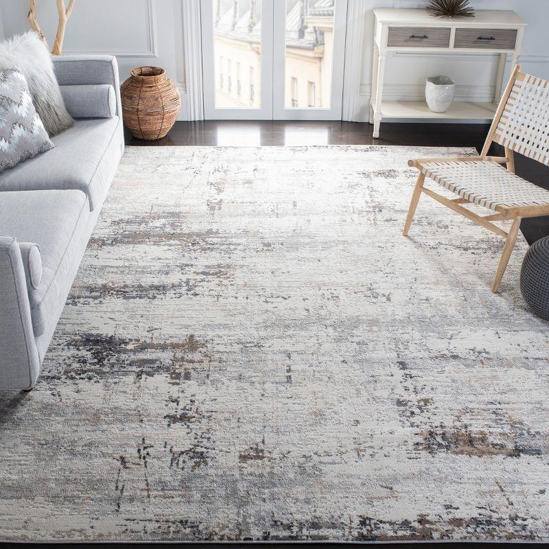 Ivory and Gray Abstract 8' x 10' Stain-Resistant Rug