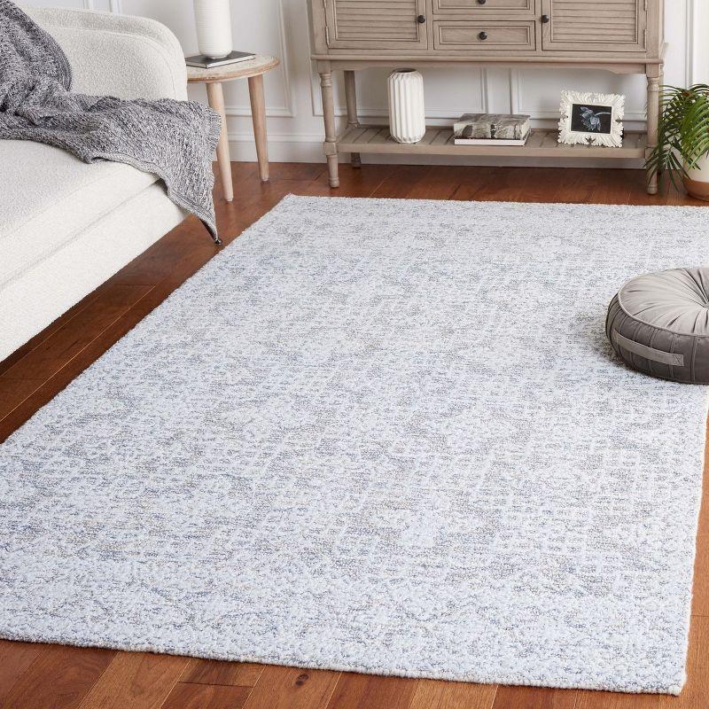 Gray Rectangular Tufted Wool and Synthetic Area Rug