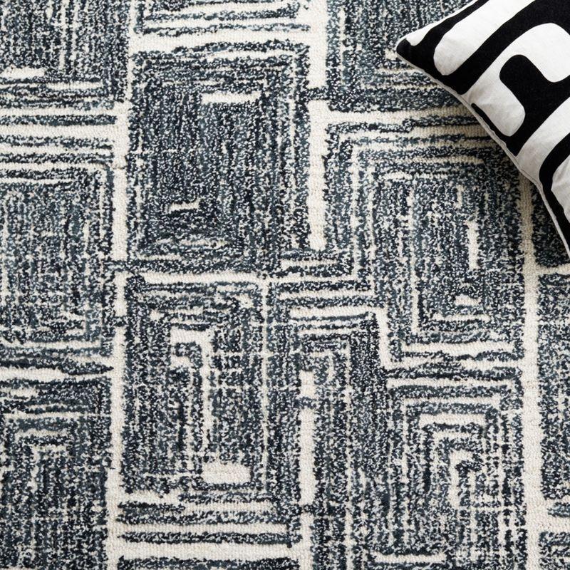 Metro MET177 Hand Tufted Indoor Area Rug - Black/Ivory - 4'x6' - Safavieh