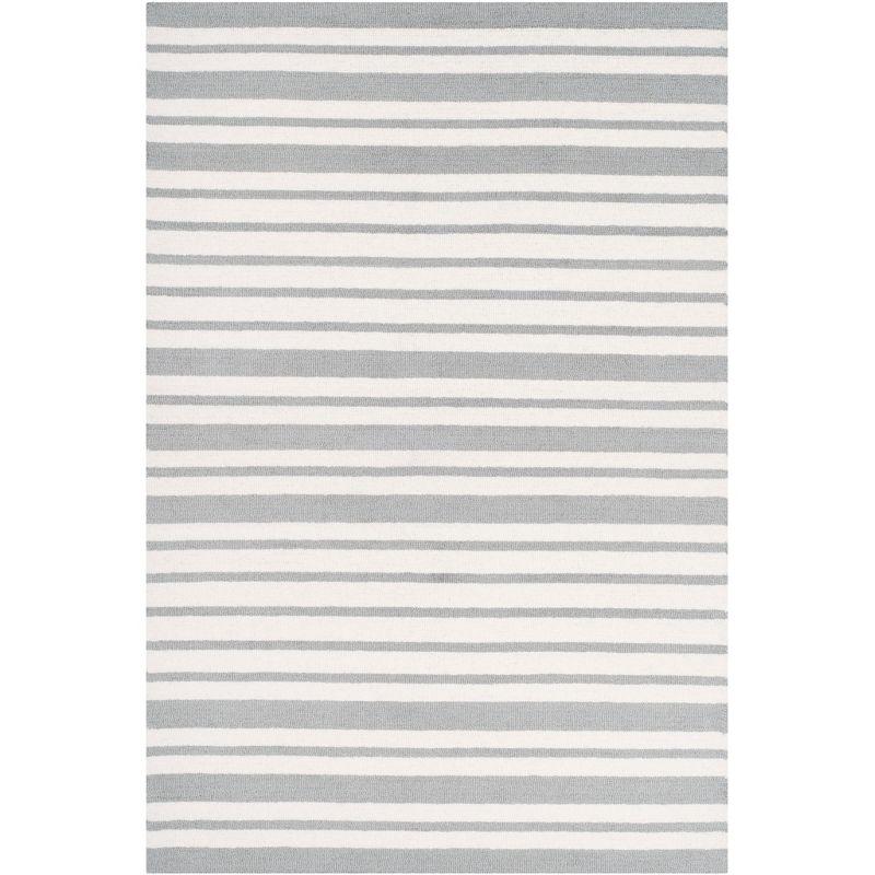 Safavieh Kids SFK917 Hand Tufted Area Rug  - Safavieh