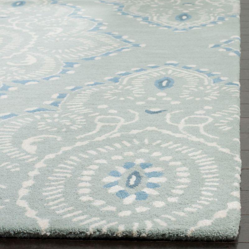 Wyndham WYD372 Hand Tufted Area Rug - Blue/Ivory - 6'x9' - Safavieh.