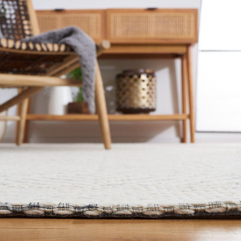 Marbella Ivory and Black Handwoven Wool Area Rug