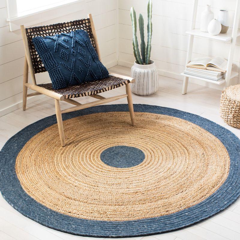 47" Gray and White Braided Wool Cotton Round Rug