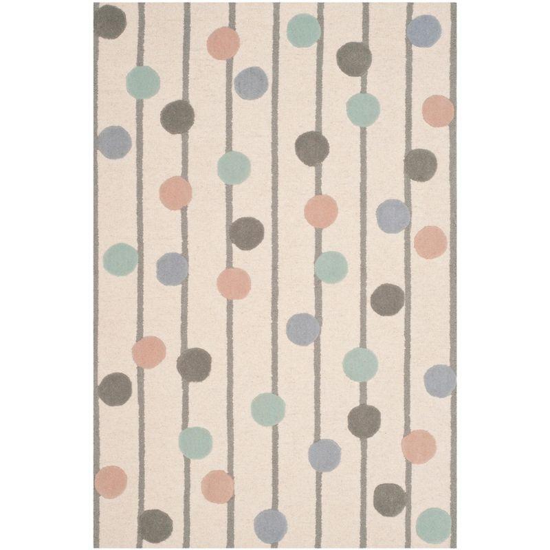 Safavieh Kids SFK909 Hand Tufted Area Rug  - Safavieh