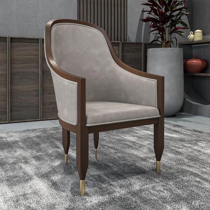 Everly Quinn Jacinto Dining Chair Upholstered In Leather With Rubberwood Frame And Legs With Gold Caps