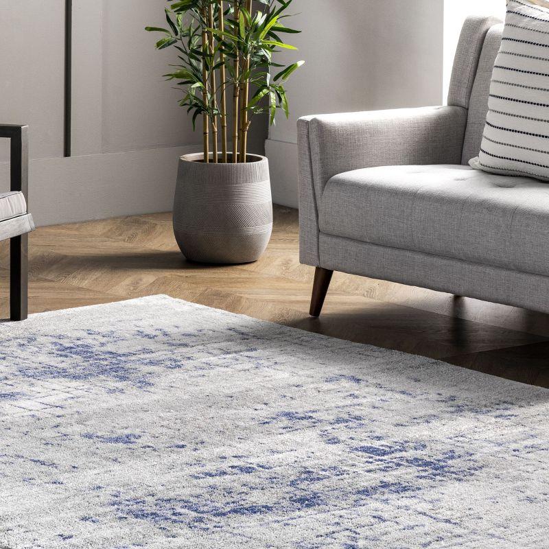 Gray and Blue Abstract 8' x 10' Synthetic Area Rug