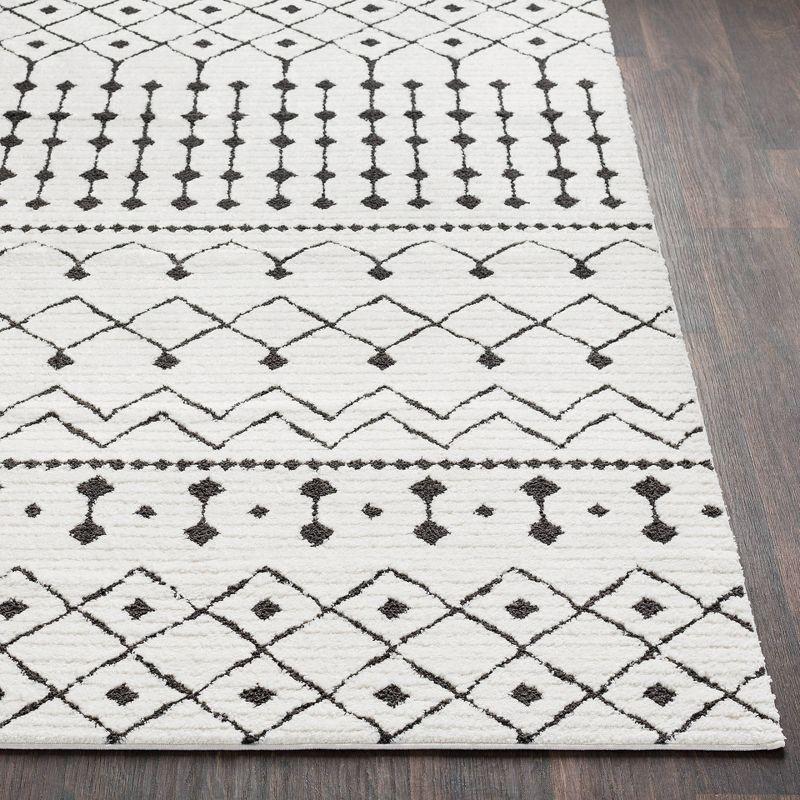 Elegant Black and Charcoal Shag Area Rug with Geometric Design