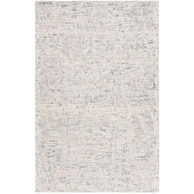 Handmade Light Blue and Ivory Abstract Wool Tufted Rug