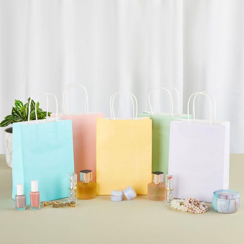 Juvale 25 Pack Pastel Gift Bags with Handles, Paper Party Favor Bags, for Goodies, Birthdays, 5 Colors - 6.3x3.2x8.7 inch