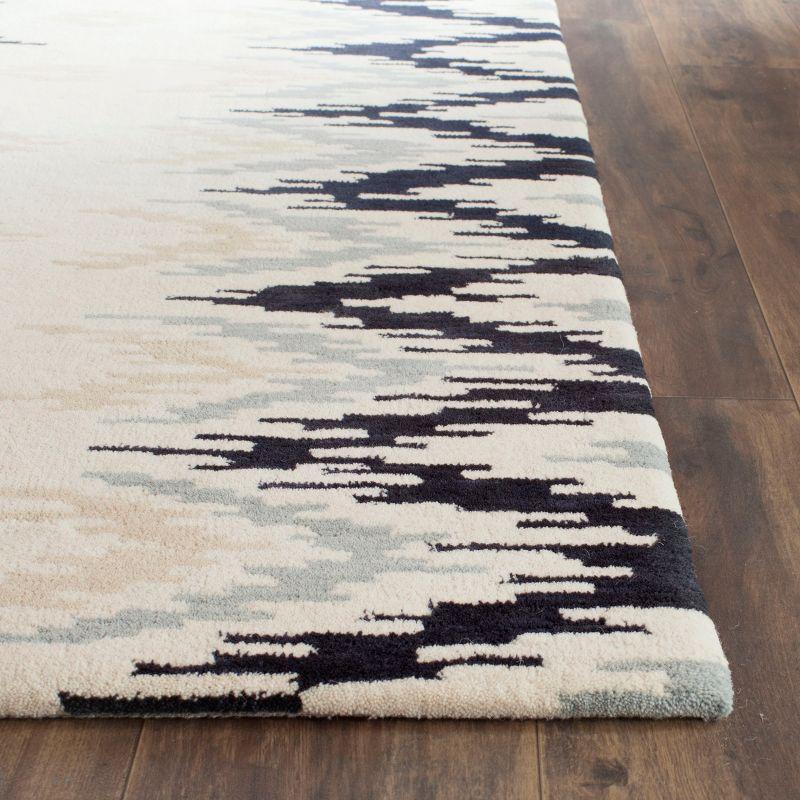 Soho SOH339 Hand Tufted Area Rug  - Safavieh