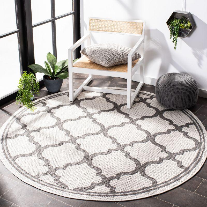 Bermuda BMU810 Power Loomed Indoor/Outdoor Machine Washable Area Rug - Ivory/Grey - 6'7" Round - Safavieh