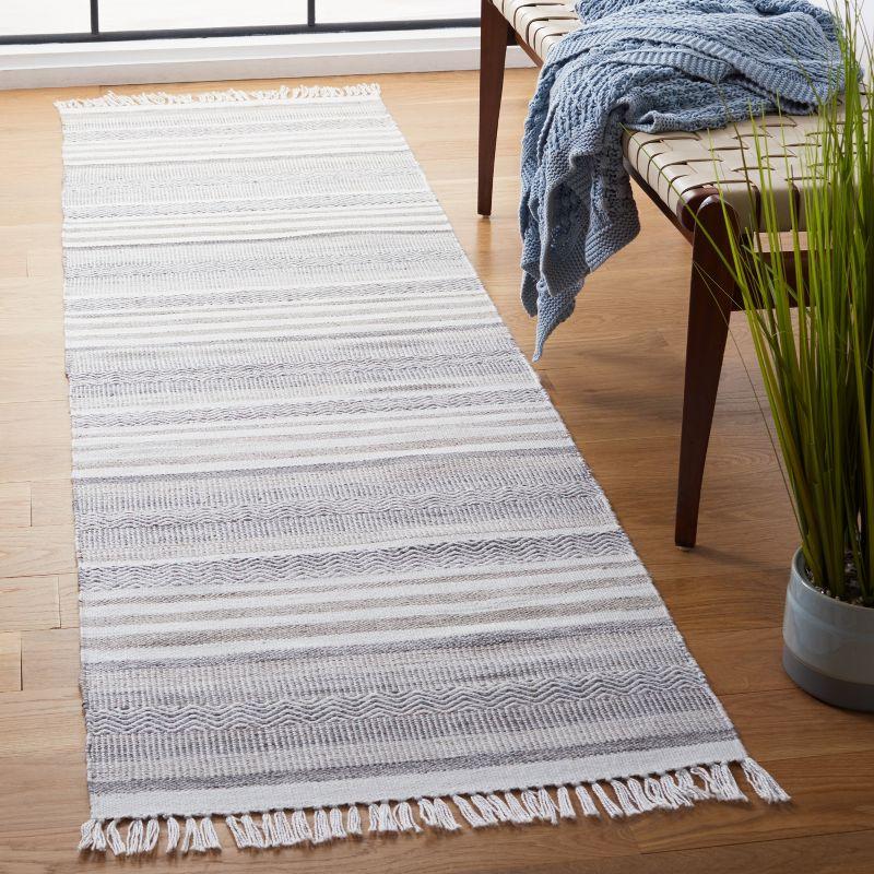 Ivory and Charcoal Flat Woven Synthetic Area Rug