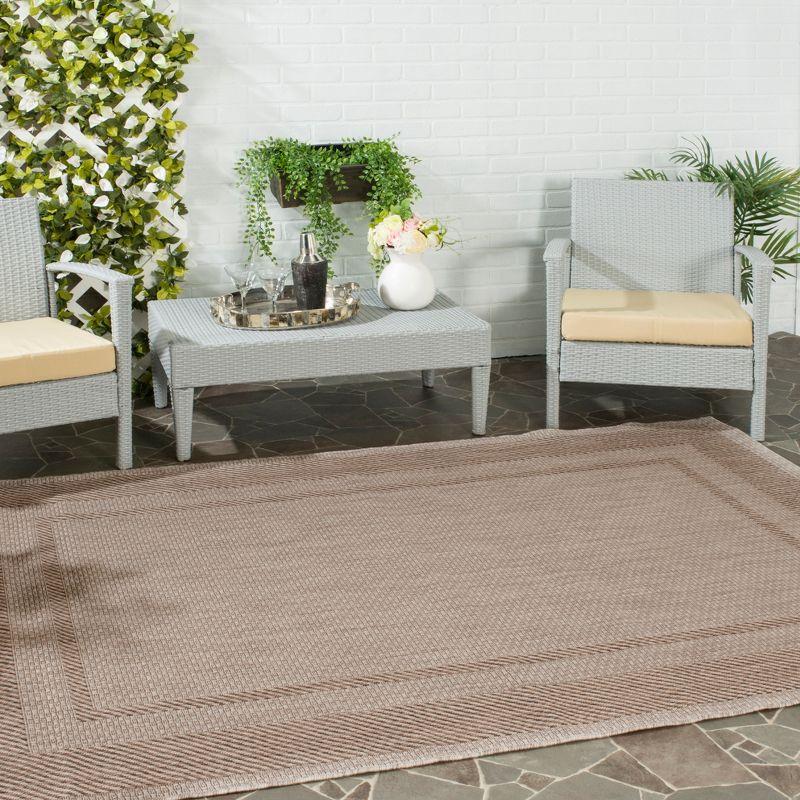 Beige & Brown Round Synthetic 47" Indoor/Outdoor Area Rug