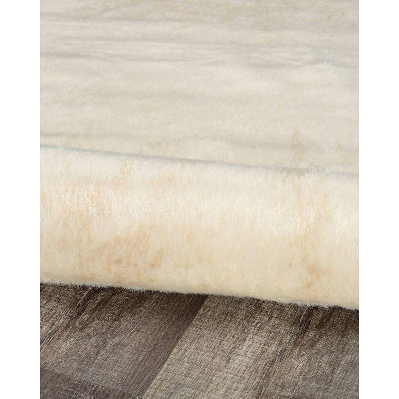 Ivory Tufted Rectangular 5' x 7' Synthetic Cowhide Rug