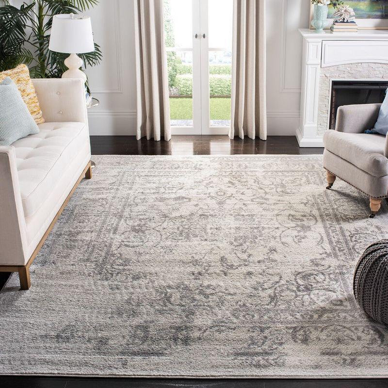 Ivory and Silver Synthetic 8' x 10' Easy-Care Rectangular Rug