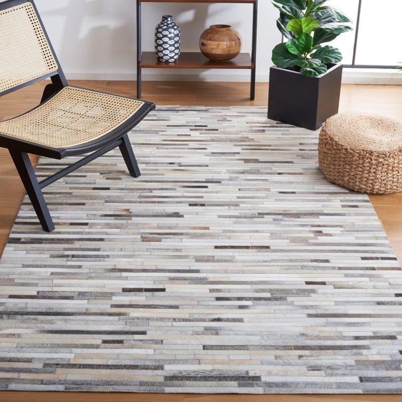 Ivory and Grey Hand-Knotted Geometric Cowhide Area Rug