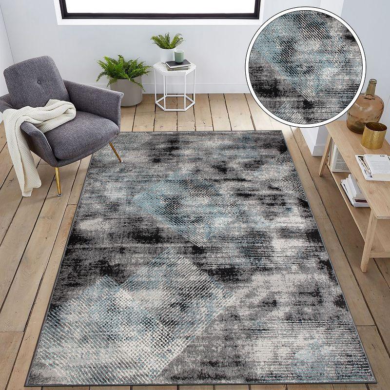 Reversible Geometric Black Synthetic 5' x 7' Area Rug