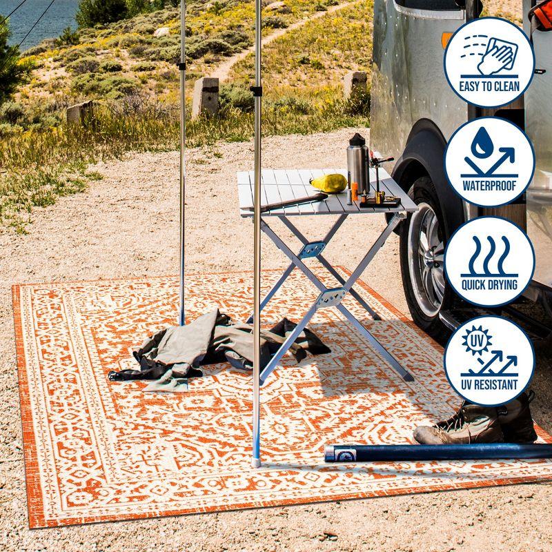 9' x 12' Sinjuri Medallion Textured Weave Indoor/Outdoor Area Rug, Orange/Cream - JONATHAN Y