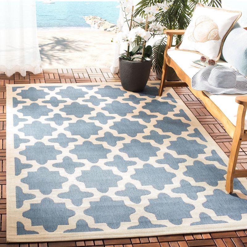 Blue and Beige Synthetic 79" Rectangular Indoor/Outdoor Rug