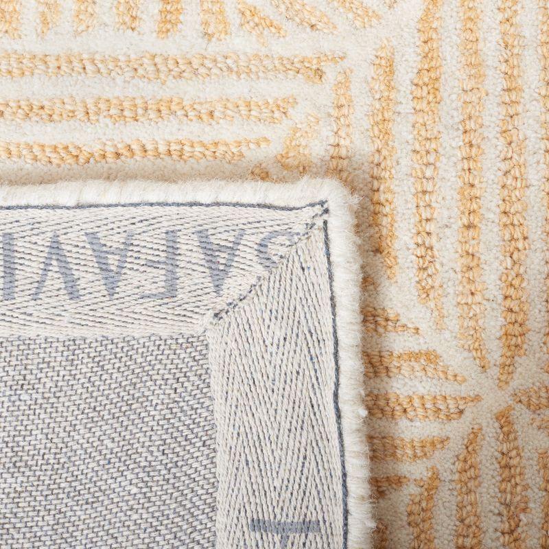 Abstract ABT763 Handmade Indoor Area Rug - Gold/Ivory - 4'x6' - Safavieh