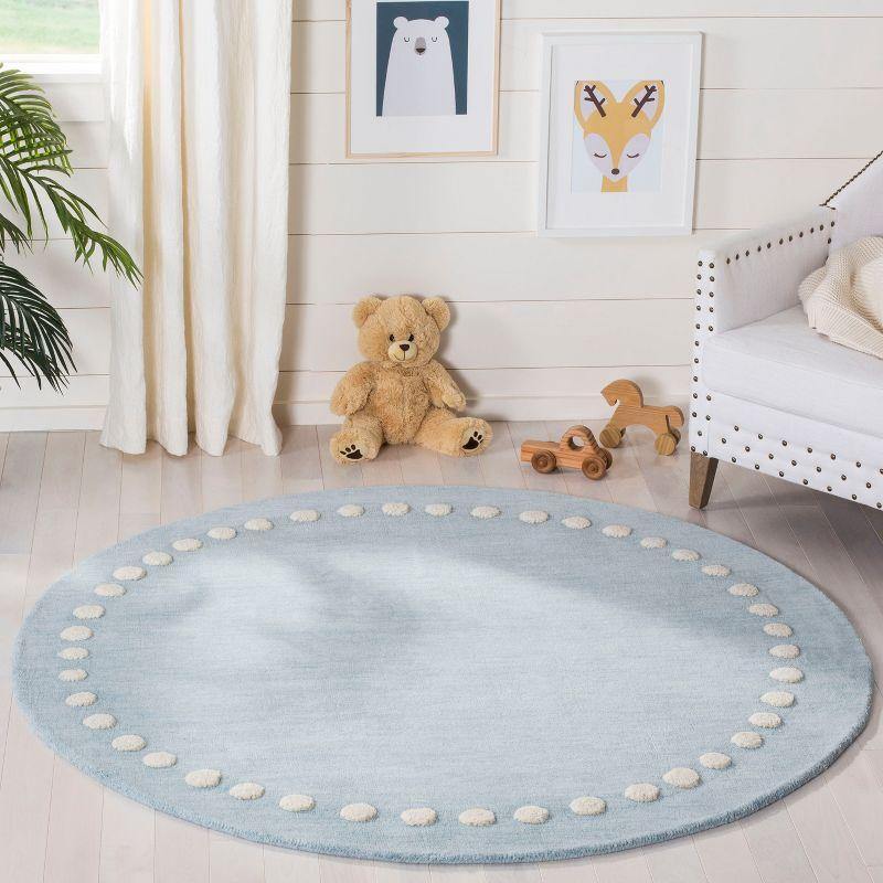 Safavieh Kids SFK802 Hand Loomed Indoor Area Rug - Blue/Ivory - 5' Round - Safavieh