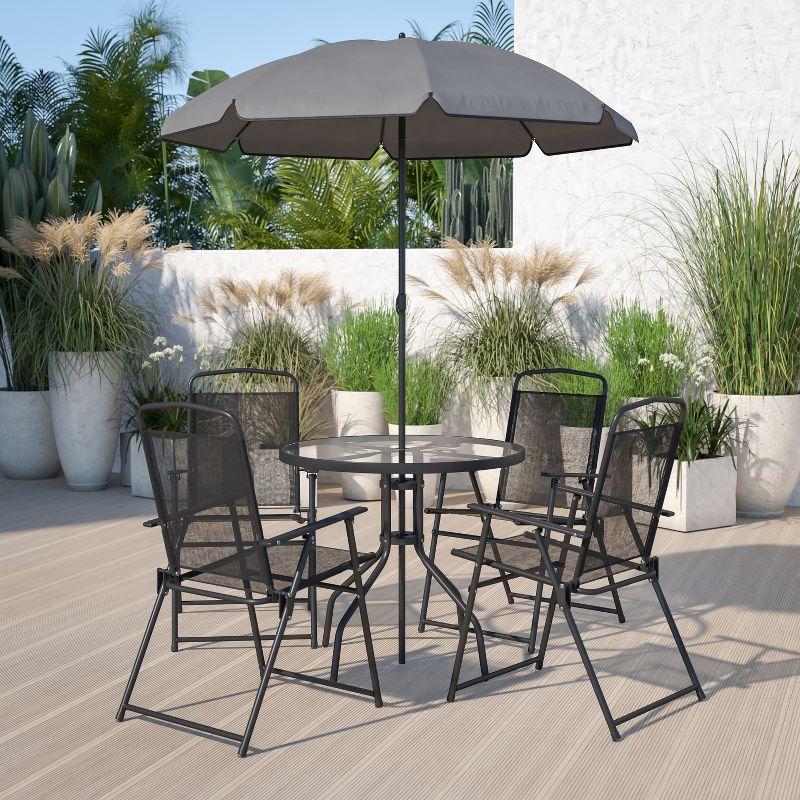 Emma and Oliver 6 Piece Black Patio Garden Set with Umbrella Table and Set of 4 Folding Chairs