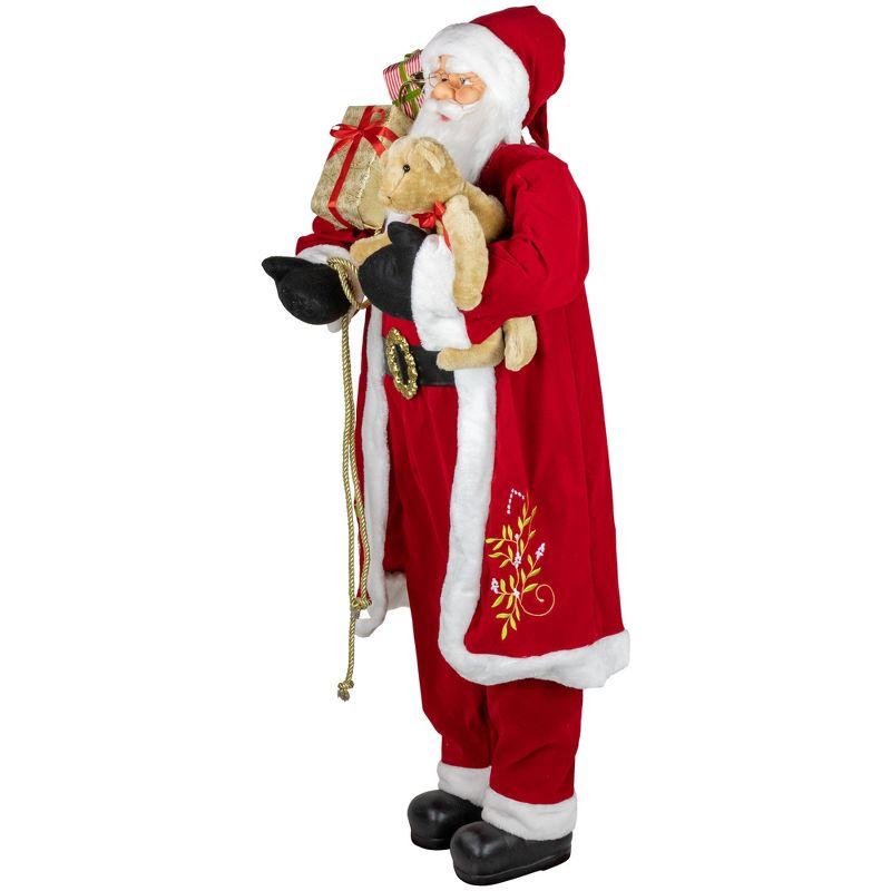 Northlight 5' Traditional Santa Claus with Teddy Bear and Gift Bag Standing Christmas Figure