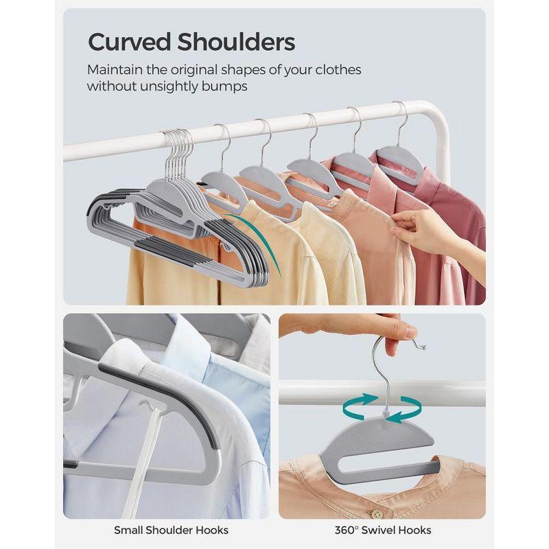 SONGMICS Coat Hangers Non-Slip Clothes Hangers Space-Saving Plastic Hangers 360°Swivel Rose Gold Hook