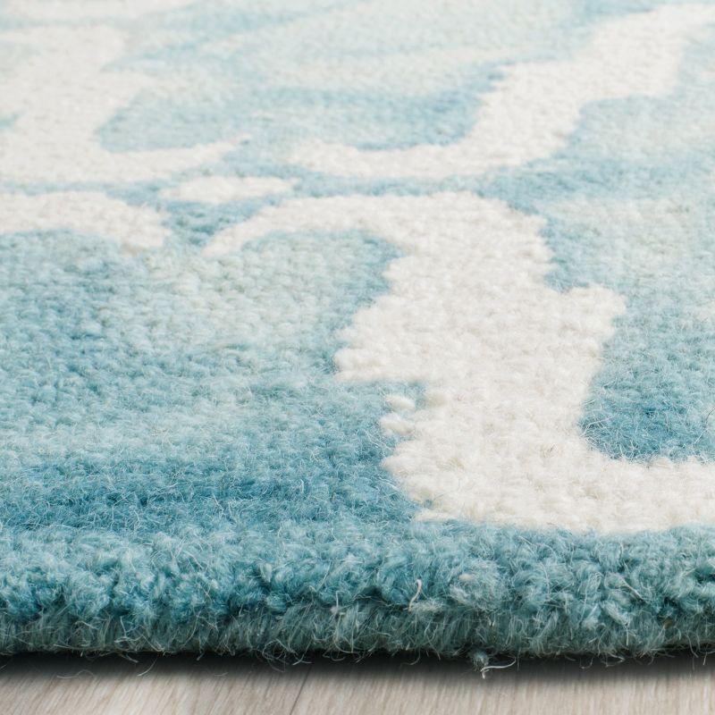 Turquoise and Ivory Hand-Tufted Wool 4' x 6' Area Rug