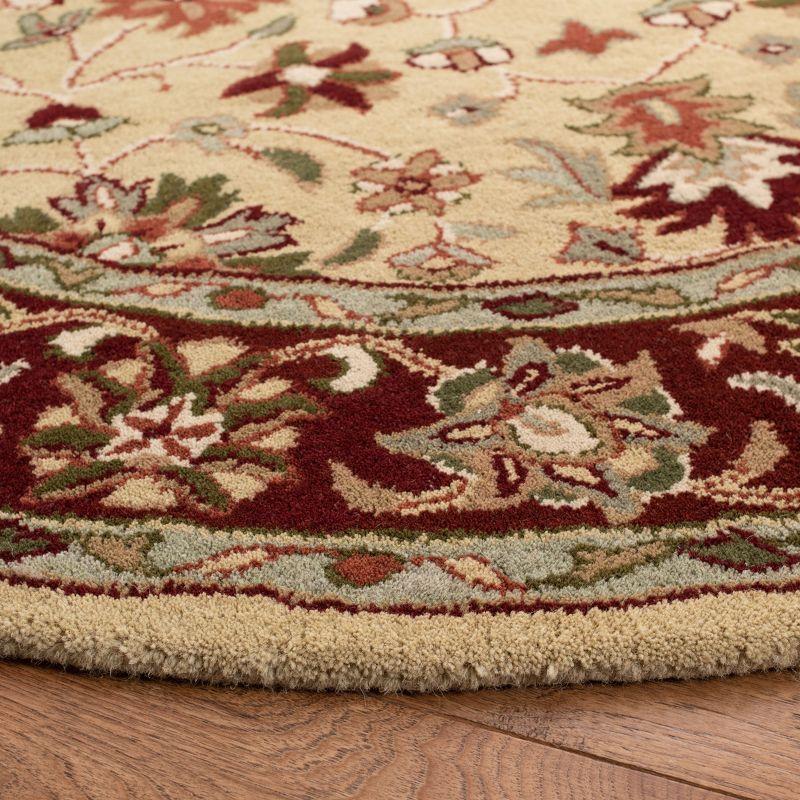 Heritage HG965 Hand Tufted Area Rug - Ivory/Red - 6' Round - Safavieh.