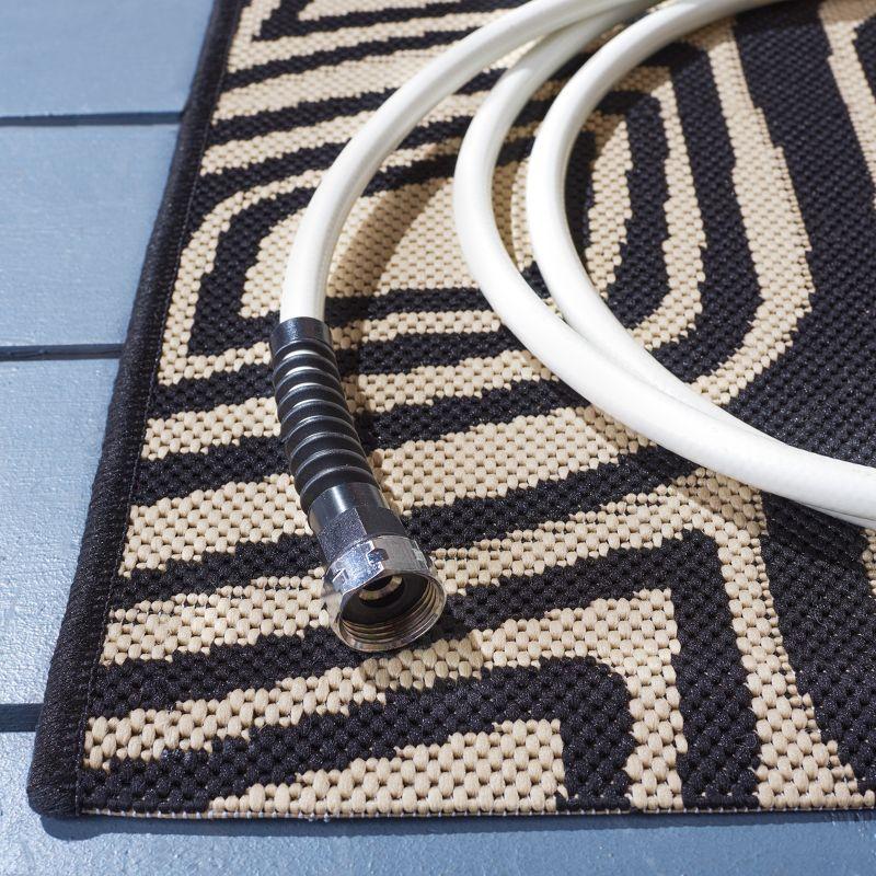 Geometric Black and Beige Synthetic Outdoor Area Rug