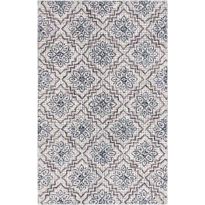 Ivory and Navy Tufted Wool Abstract Area Rug