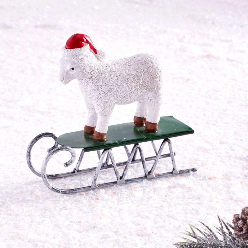 White Ceramic Christmas Sheep Figurine on Sleigh