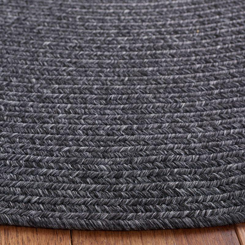 Braided BRA201 Hand Woven Indoor Machine Washable Area Rug - Black - 4'x6' Oval - Safavieh