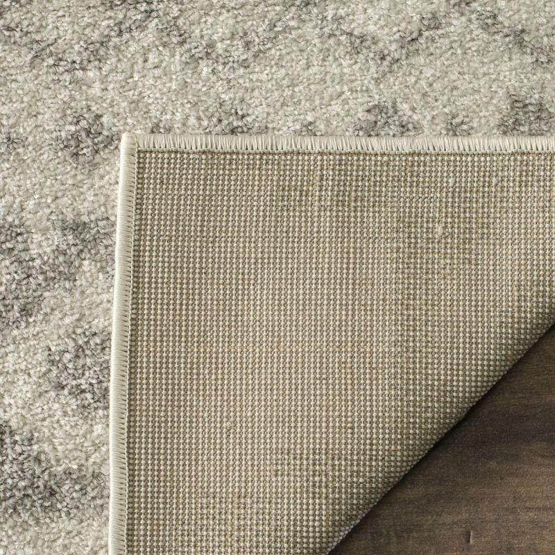 Chic Ivory & Silver Synthetic 10' x 14' Easy-Care Area Rug