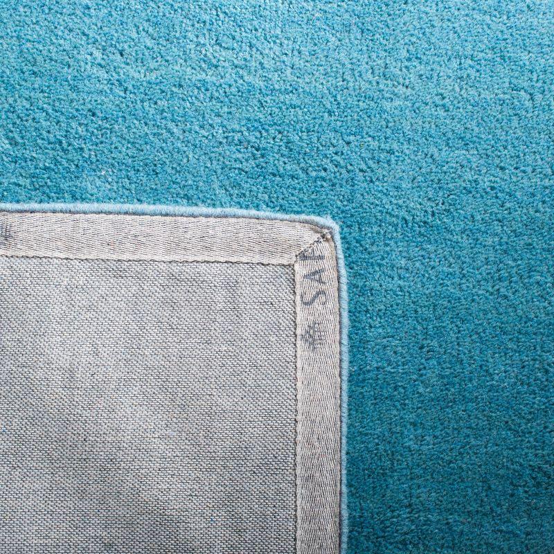 Moreau Hand Tufted Wool Solid Color Rug